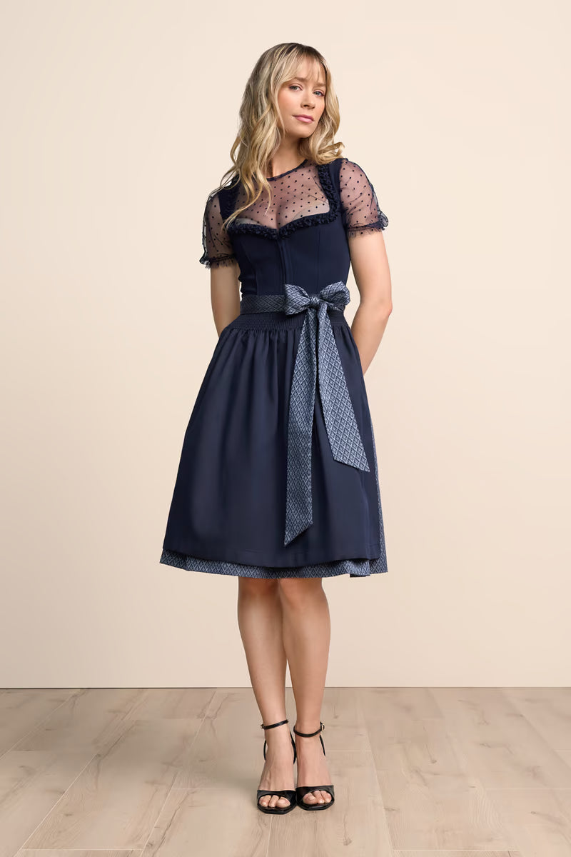 Traditionell dirndl dam i blått