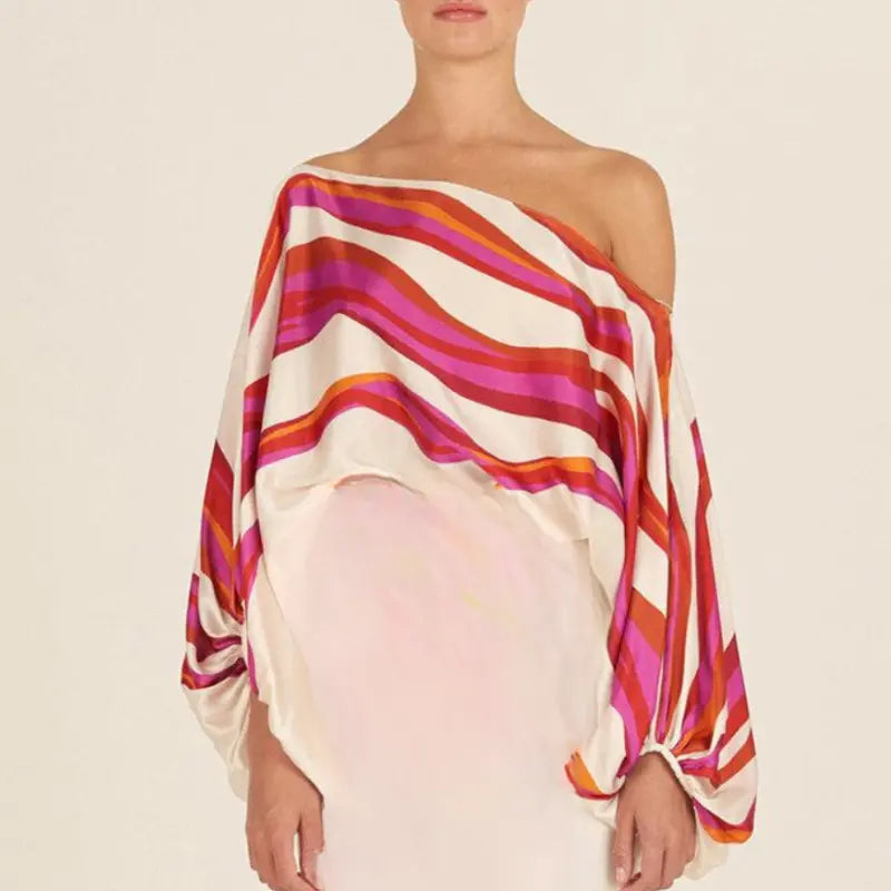 Tvådelat set dam med off-shoulder topp och vida byxor