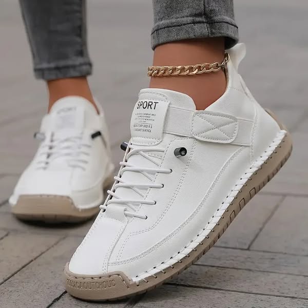 Texturerade sneakers dam i textil med snörning