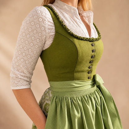 Dirndl dam med rosett — klassisk Oktoberfest-klänning