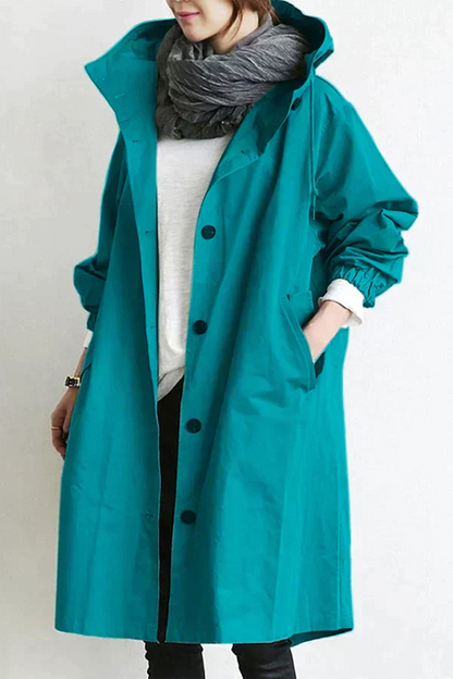 Regnrock dam i polyester – vattentät och andningsbar med oversize-huva