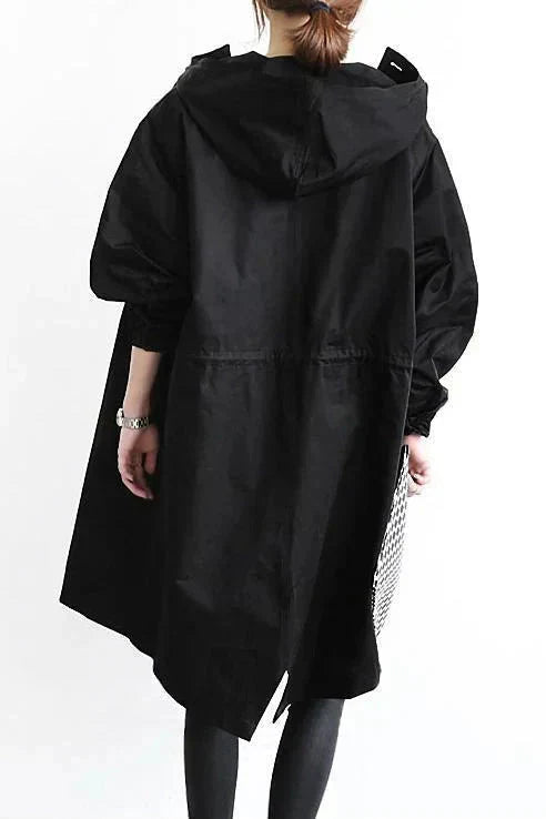 Regnrock dam i polyester – vattentät och andningsbar med oversize-huva