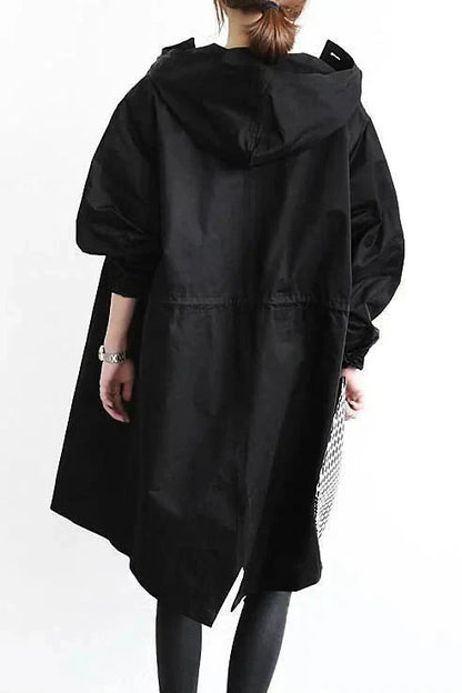 Regnrock dam i polyester – vattentät och andningsbar med oversize-huva
