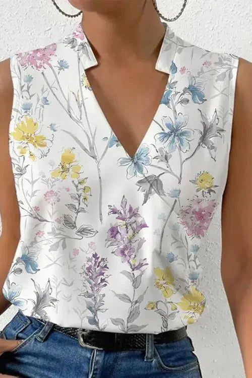 Ärmlös v-ringad blus dam i polyester — blommig sommarblus med omlott