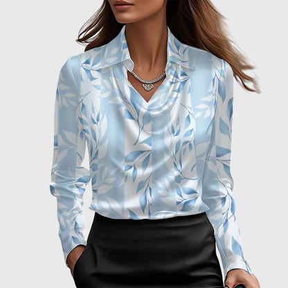 Elegant damblus med plisserad halsringning