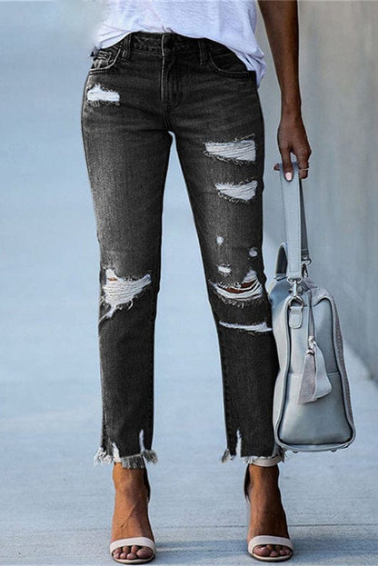 Rippade raka damjeans i denim — distressed jeans med rå fåll