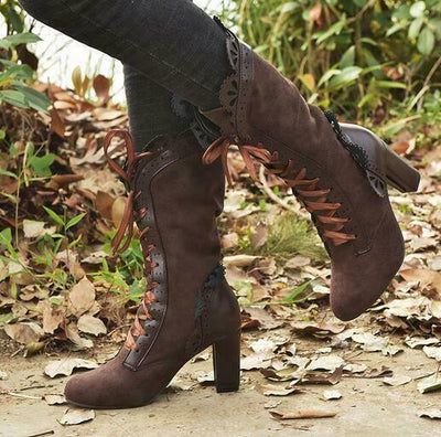 Högklackade boots dam i läderimitation — eleganta stövletter med hög klack